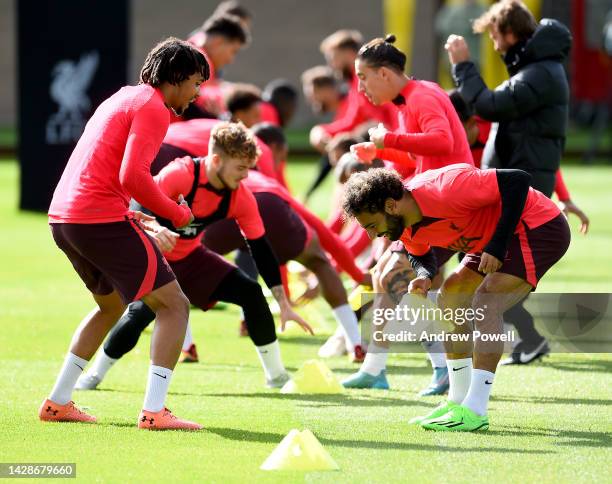 Mohamed Salah and Trent Alexander-Arnold of Liverpool during a training session at AXA Training Centre on September 29, 2022 in Kirkby, England.