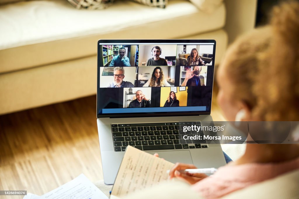 Woman Planning Strategy With Colleagues in Meeting