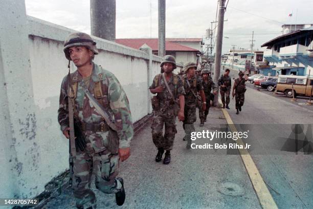 Panamanian Defense Troops patrol the streets near the Headquarters of Gen. Manuel Noriega, October 5, 1989 in Panama City, Panama.