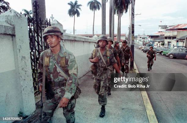 Panamanian Defense Troops patrol the streets near the Headquarters of Gen. Manuel Noriega, October 5, 1989 in Panama City, Panama.