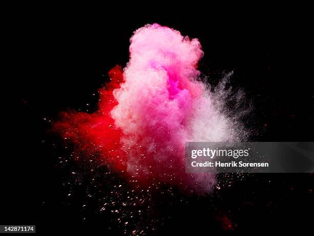 explosion of colored powder - powder burst stock pictures, royalty-free photos & images