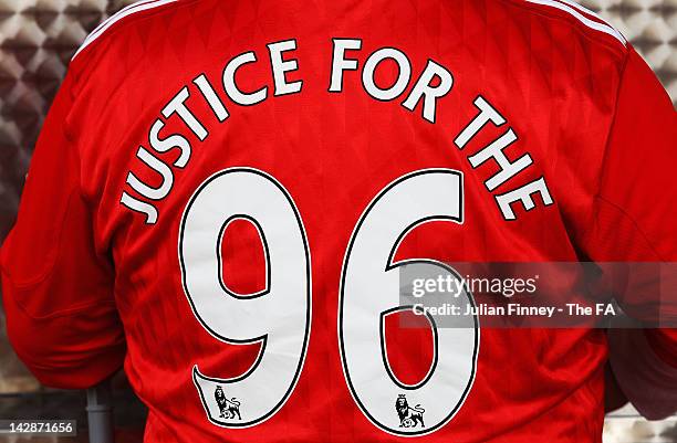 An Liverpool fan wears a shirt in remembrance of the 23rd year anniversary of the Hillsborough disaster ahead of the FA Cup with Budweiser Semi Final...