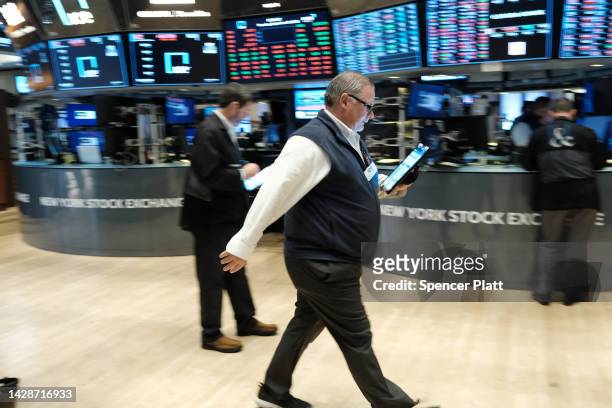 Traders work on the floor of the New York Stock Exchange on September 29, 2022 in New York City. U.S. Stocks fell in morning trading as recession...