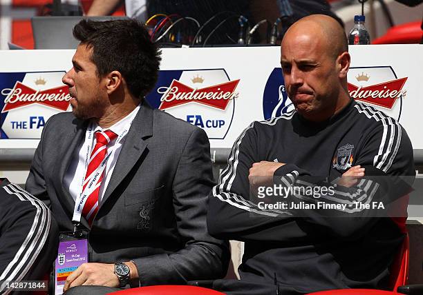 Banned goalkeepers Alexander Doni and Pepe Reina of Liverpool look on ahead of the FA Cup with Budweiser Semi Final match between Liverpool and...