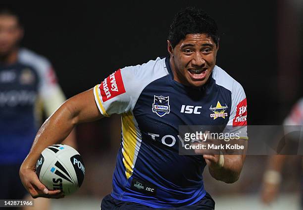 Kalifa Fai Fai Loa of the Cowboys runs the ball during the round seven NRL match between the Sydney Roosters and the North Queensland Cowboys at TIO...