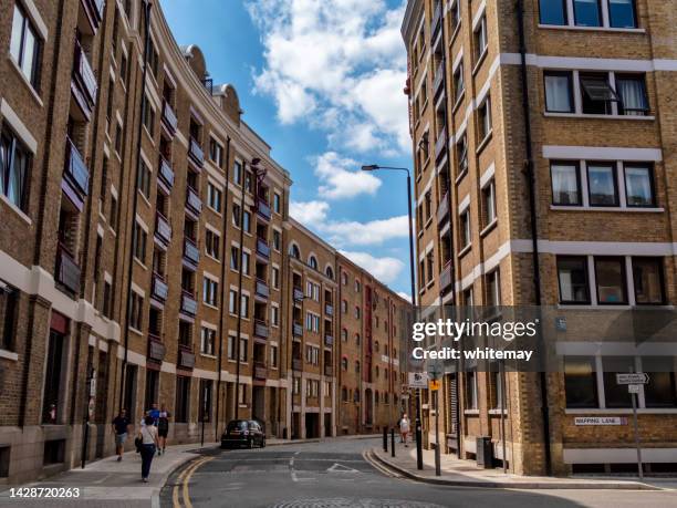 converted warehouses in wapping high street, east london - wapping stock pictures, royalty-free photos & images