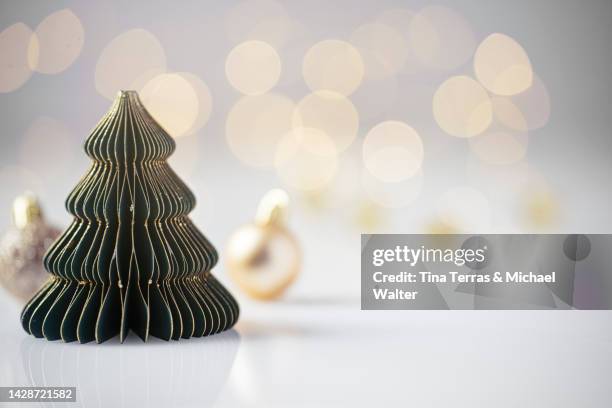 christmas tree made of paper. christmas decoration. - weihnachten modern stock-fotos und bilder
