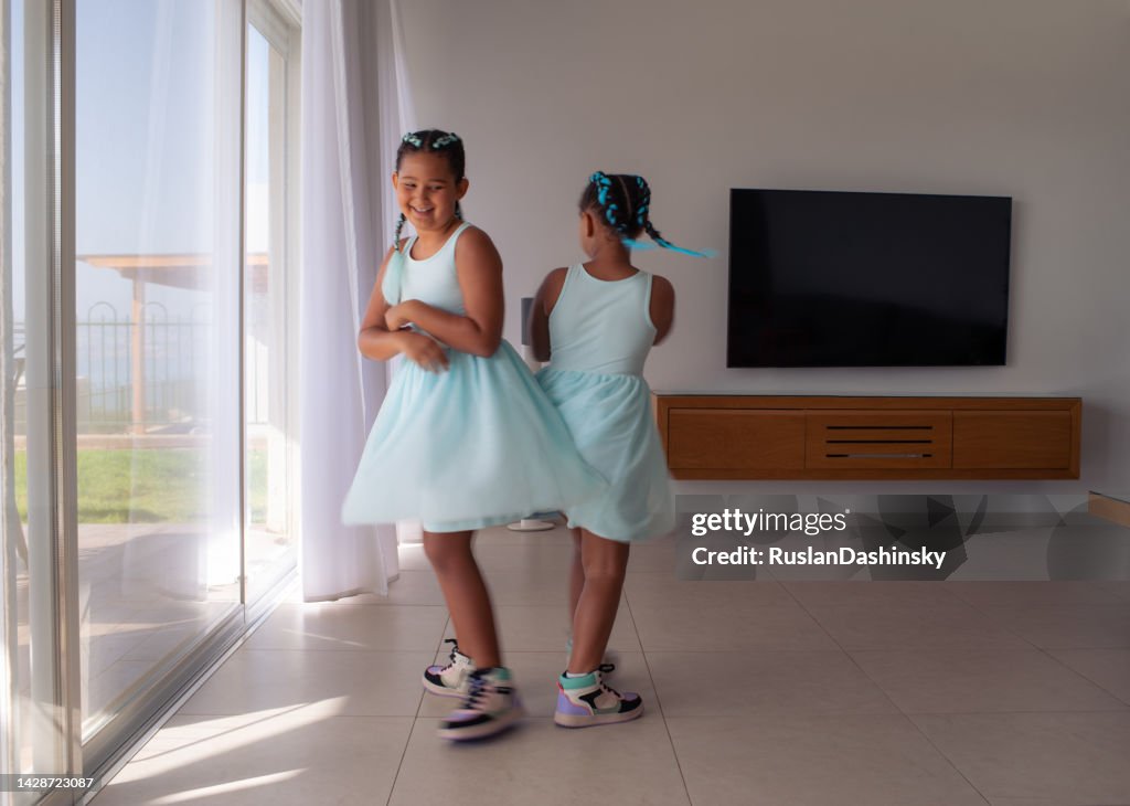 Twins in spinning dance.