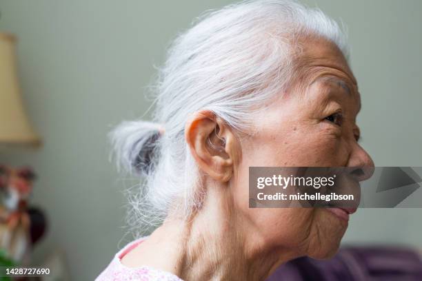 hearing aids - hearing aids stock pictures, royalty-free photos & images