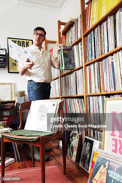 Portrait of Jonny Trunk at home with his collection of vinyl records, taken on December 21, 2010. Trunk is the founder of independent record label...