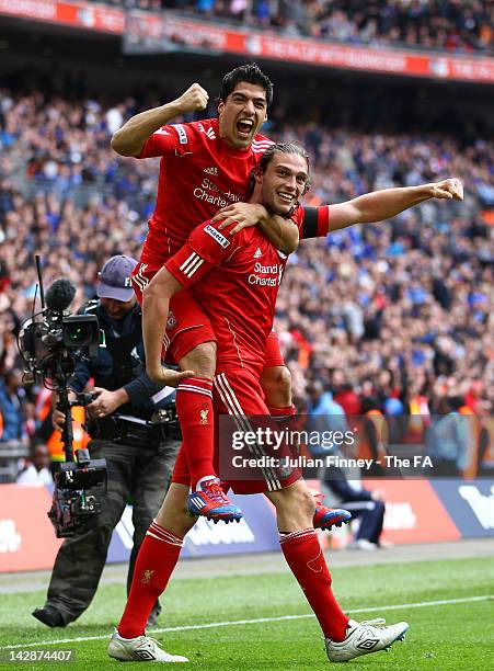 Andy Carroll of Liverpool celebrates scoring his side's second goal with team mate Luis Suarez during the FA Cup with Budweiser Semi Final match...