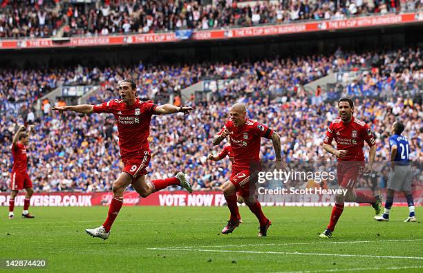 Andy Carroll of Liverpool celebrates with Martin Skrtel and Maxi Rodriguez as he scores their second goal during the FA Cup with Budweiser Semi Final...