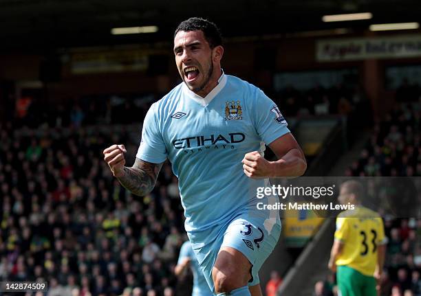 Carlos Tevez of Manchester City celebrates scoring his team's third goal during the Barclays Premier League match between Norwich City and Manchester...