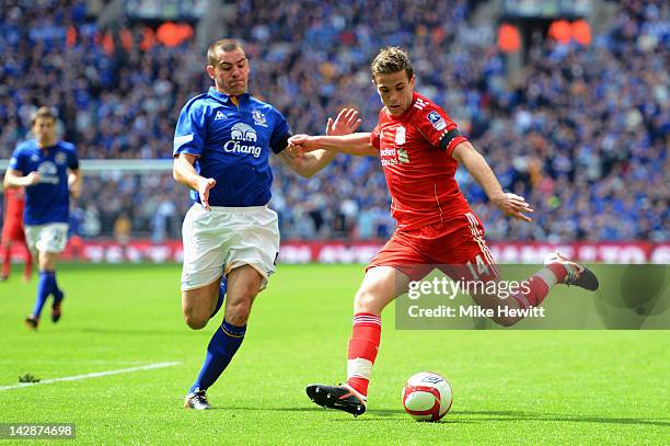 Jordan Henderson of Liverpool takes on Darron Gibson of Everton during the FA Cup with Budweiser Semi Final match between Liverpool and Everton at...