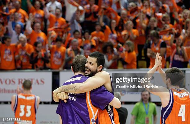 Vitor Faverani, #13 and Serhiy Lishchuk, #12 of Valencia Basket celebrate after semi-final A of the 2012 Eurocup Finals between Valencia Basket v...