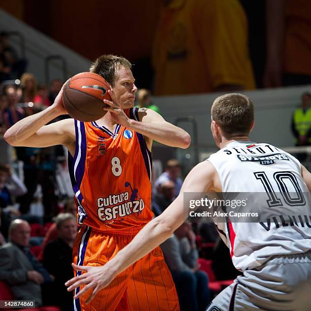 Brad Newley, #8 of Valencia Basket and Renaldas Seibutis, #10 of Lietuvos Rytas in action during semi-final A of the 2012 Eurocup Finals between...