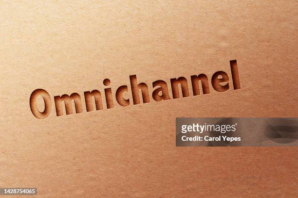 omnichannel in wooden letters - omnichannel retail stock pictures, royalty-free photos & images