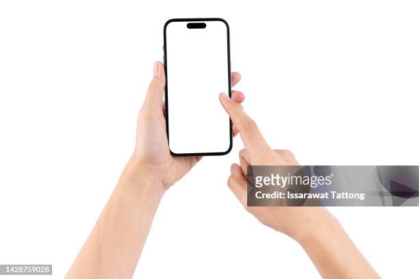smartphone in female hands taking photo isolated on white blackground - hand smartphone stock-fotos und bilder