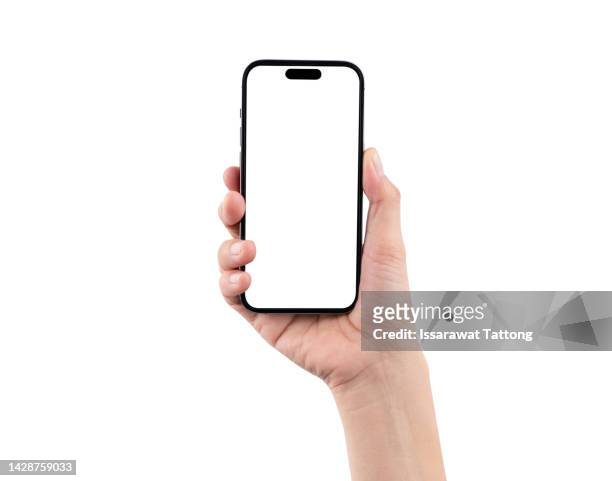 close up hand hold phone isolated on white background - smartphone mockup stock-fotos und bilder