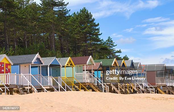 beach huts - norfolk england stock pictures, royalty-free photos & images