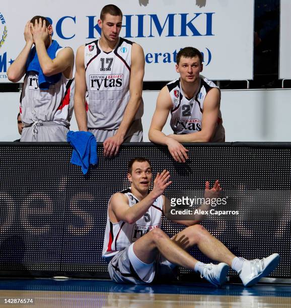 Jonas Valanciunas, #17, Arturas Jomantas, #21 and Steponas Babrauskas, #5 of Lietuvos Rytas react during the semifinal A of 2012 Eurocup Finals...