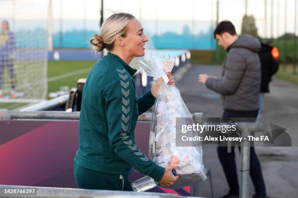 Toni Duggan of Everton FC reacts as she receives a baby gift prior to the FA Women's Super League match between Everton FC and Leicester City at...