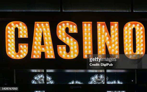 single english word "casino" sign at night - light bulb letters stock pictures, royalty-free photos & images