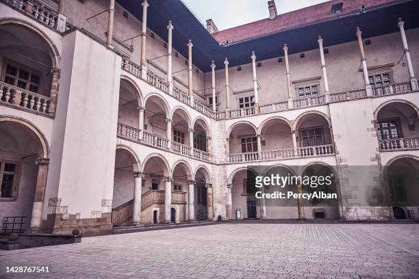 view of arcade courtyard of the wawel castle - opening of polish vodka museum stockfoto's en -beelden