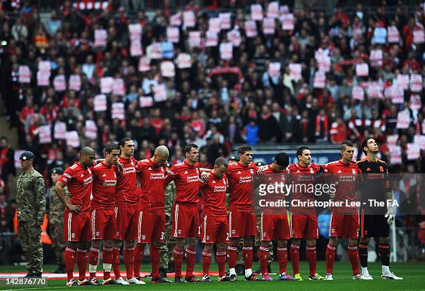 The Liverpool team line up during a minute's silence in remembrance of the 23rd year anniversary of the Hillsborough disaster ahead of the FA Cup...