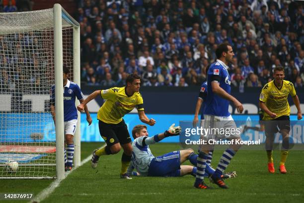 Sebastian Kehl of Dortmund celebrates the second goal against Schalke during the Bundesliga match between FC Schalke 04 and Borussia Dortmund at...