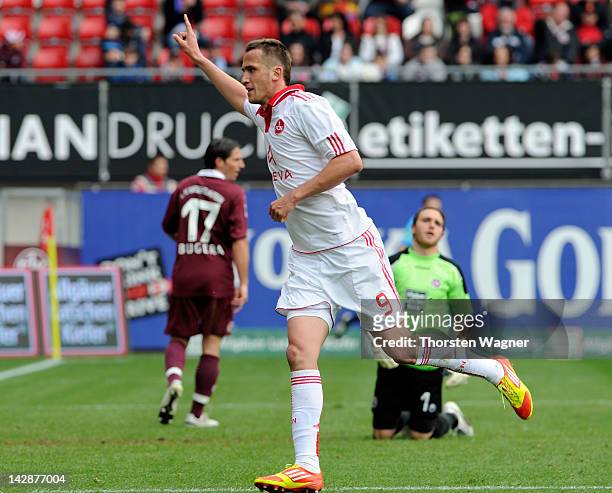 Tomas Pekhart of Nuernberg celebrates after scoring his teams second goal during the Bundesliga match between 1.FC Kaiserslautern and FC Nuernberg at...