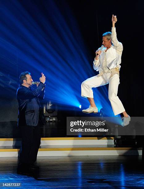 Entertainer Joey Fatone and television personality Carson Kressley perform during the grand opening of "Dancing With the Stars: Live in Las Vegas" at...