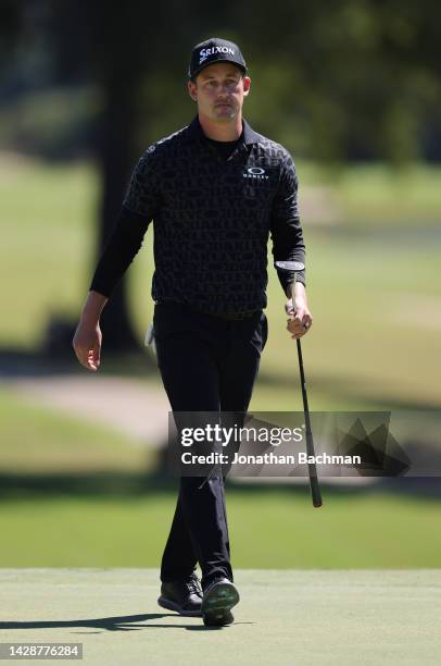 Andrew Putnam of the United States reacts to his putt on the 18th green during the Sanderson Farms Championship at The Country Club of Jackson on...