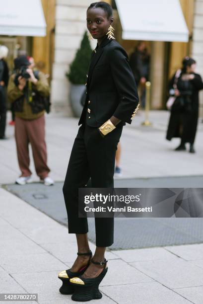 Model Rouguy Faye poses wearing Schiaparelli after the Schiaparelli show in Place Vendome during Paris Fashion Week - Womenswear Spring/Summer 2023...