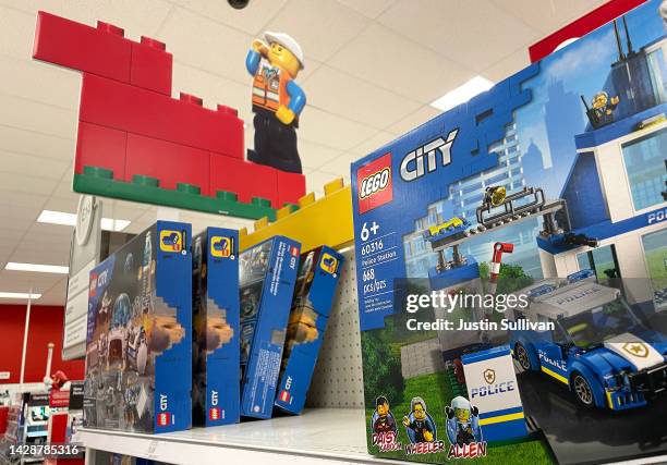 Lego City themed sets are displayed on a shelf at a Target store on September 29, 2022 in San Rafael, California. Lego sales have surged 17 percent...