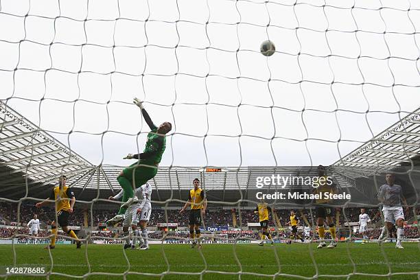 Gylfi Sigurdsson of Swansea City scores his sides first goal past a diving Paul Robinson of Blackburn Rovers during the Barclays Premier League match...