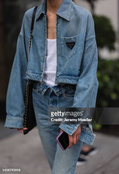 Fashion week guest seen wearing a denim look, outside Carolina Herrera during new york fashion week on September 12, 2022 in New York City.