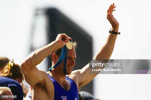 Summer Olympics: Great Britain Steve Redgrave victorious with gold medal after winning gold during Men's Coxless Fours competition at Sydney...