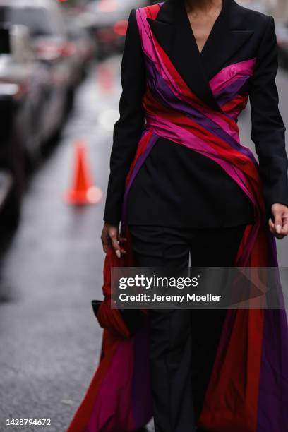 Chriselle Lim seen wearing a black look with pink highlights, outside Carolina Herrera during new york fashion week on September 12, 2022 in New York...