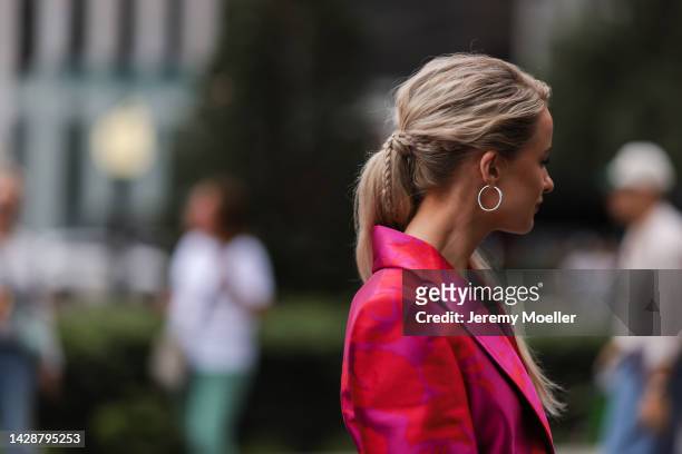 Victoria Magrath seen wearing a matching pink look, outside Carolina Herrera during new york fashion week on September 12, 2022 in New York City.