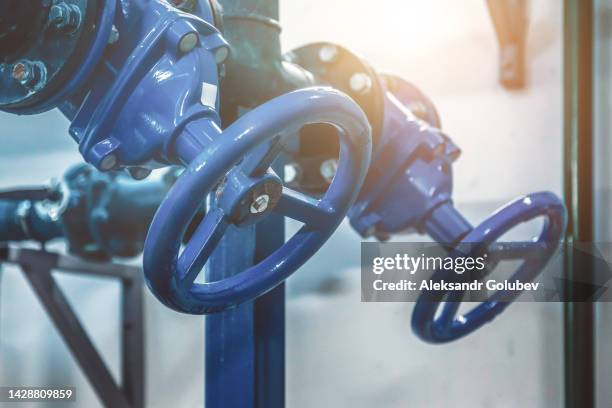 Industrial interior of water pump, valves, pressure gauges, motors inside engine room