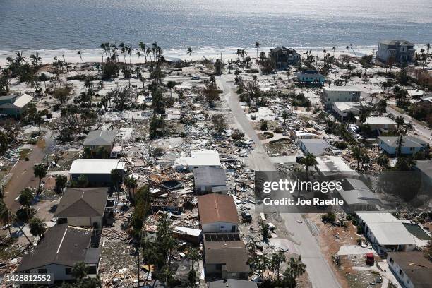 In an aerial view, damaged buildings are seen as Hurricane Ian passed through the area on September 29, 2022 in Fort Myers Beach, Florida. The...