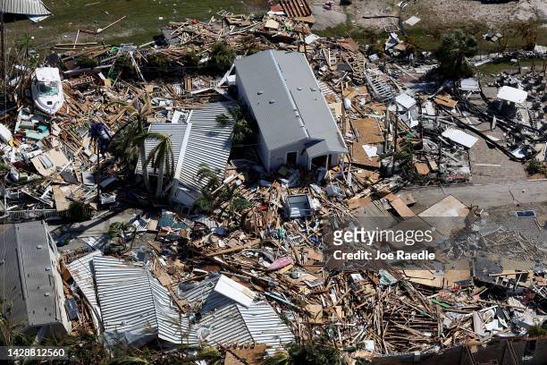 In an aerial view, damaged buildings are seen as Hurricane Ian passed through the area on September 29, 2022 in Fort Myers Beach, Florida. The...