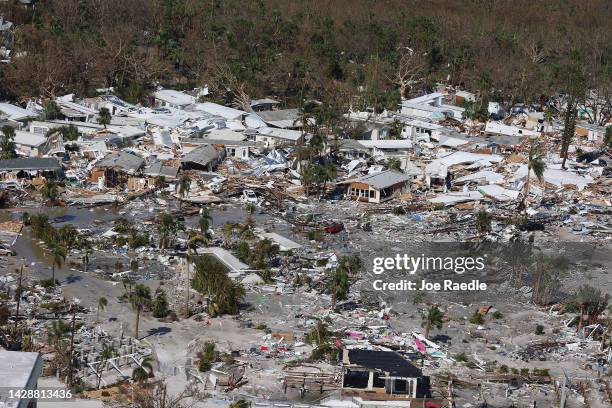 In an aerial view, damaged buildings are seen as Hurricane Ian passed through the area on September 29, 2022 in Fort Myers Beach, Florida. The...