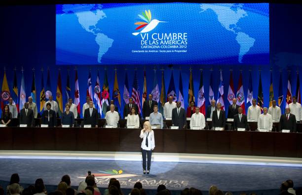Colombian singer Shakira performs the Colombian National Anthem during the opening remarks of the Summit of the Americas at the Julio Cesar Turbay...