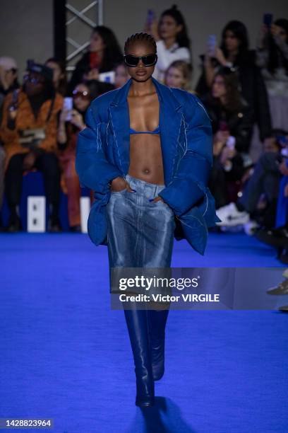 Model walks the runway during the Off White Ready to Wear Spring/Summer 2023 fashion show as part of the Paris Fashion Week on September 29, 2022 in...