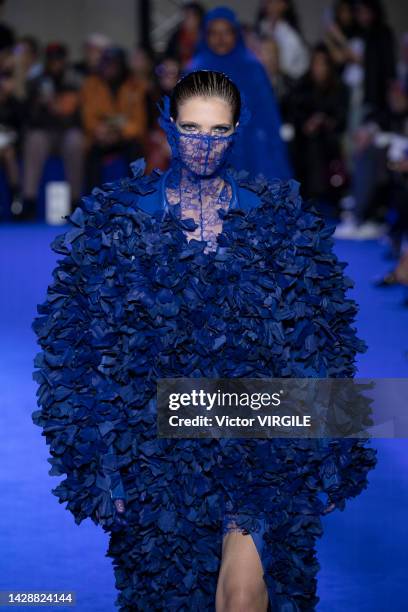 Model walks the runway during the Off White Ready to Wear Spring/Summer 2023 fashion show as part of the Paris Fashion Week on September 29, 2022 in...