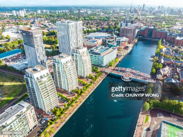 drone view of media city salford quays, manchester - manchester cityscape stock pictures, royalty-free photos & images