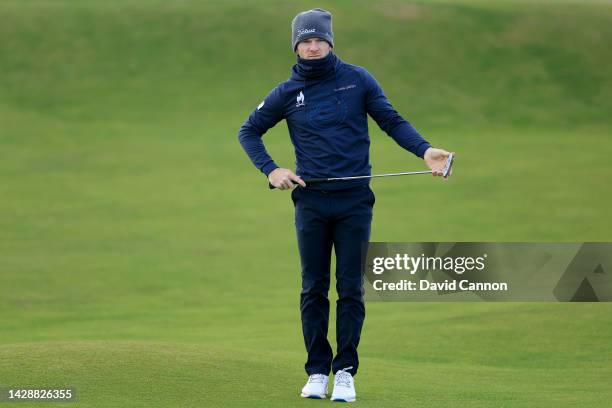 Laird Shepherd of England hits a putt on the second hole on Day One of the Alfred Dunhill Links Championship on the Old Course St. Andrews on...