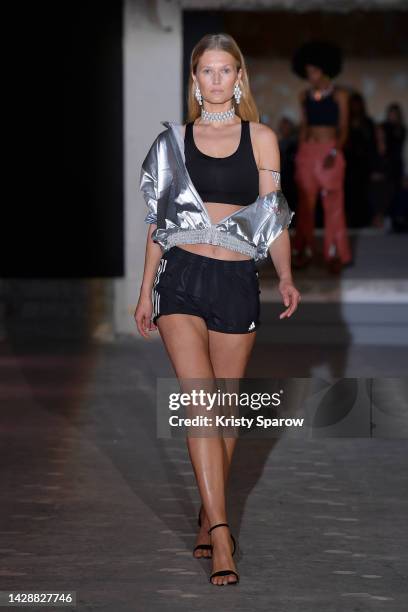 Toni Garrn walks the runway during the Messika Womenswear Spring/Summer 2023 show as part of Paris Fashion Week on September 29, 2022 in Paris,...